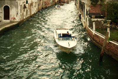 High angle view of canal in city