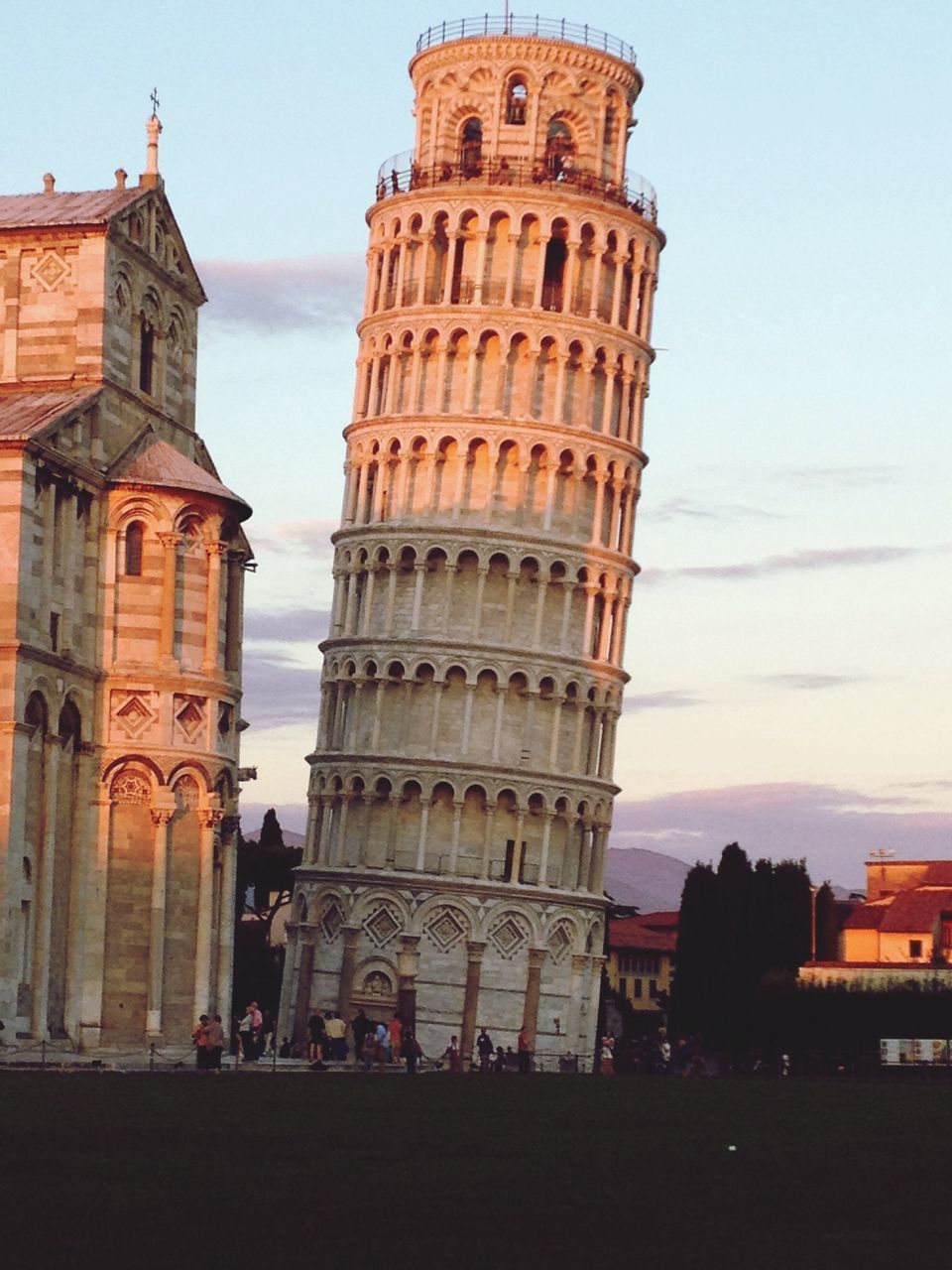 architecture, building exterior, built structure, history, sky, travel destinations, famous place, tourism, the past, old, travel, clear sky, city, incidental people, outdoors, day, building, low angle view, architectural column, window