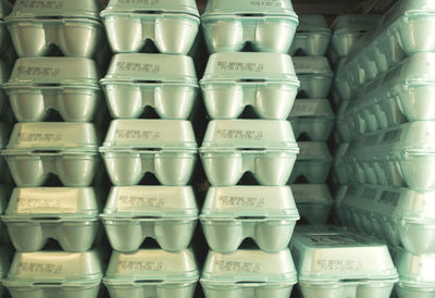 Full frame shot of stacked polystyrene egg cartons