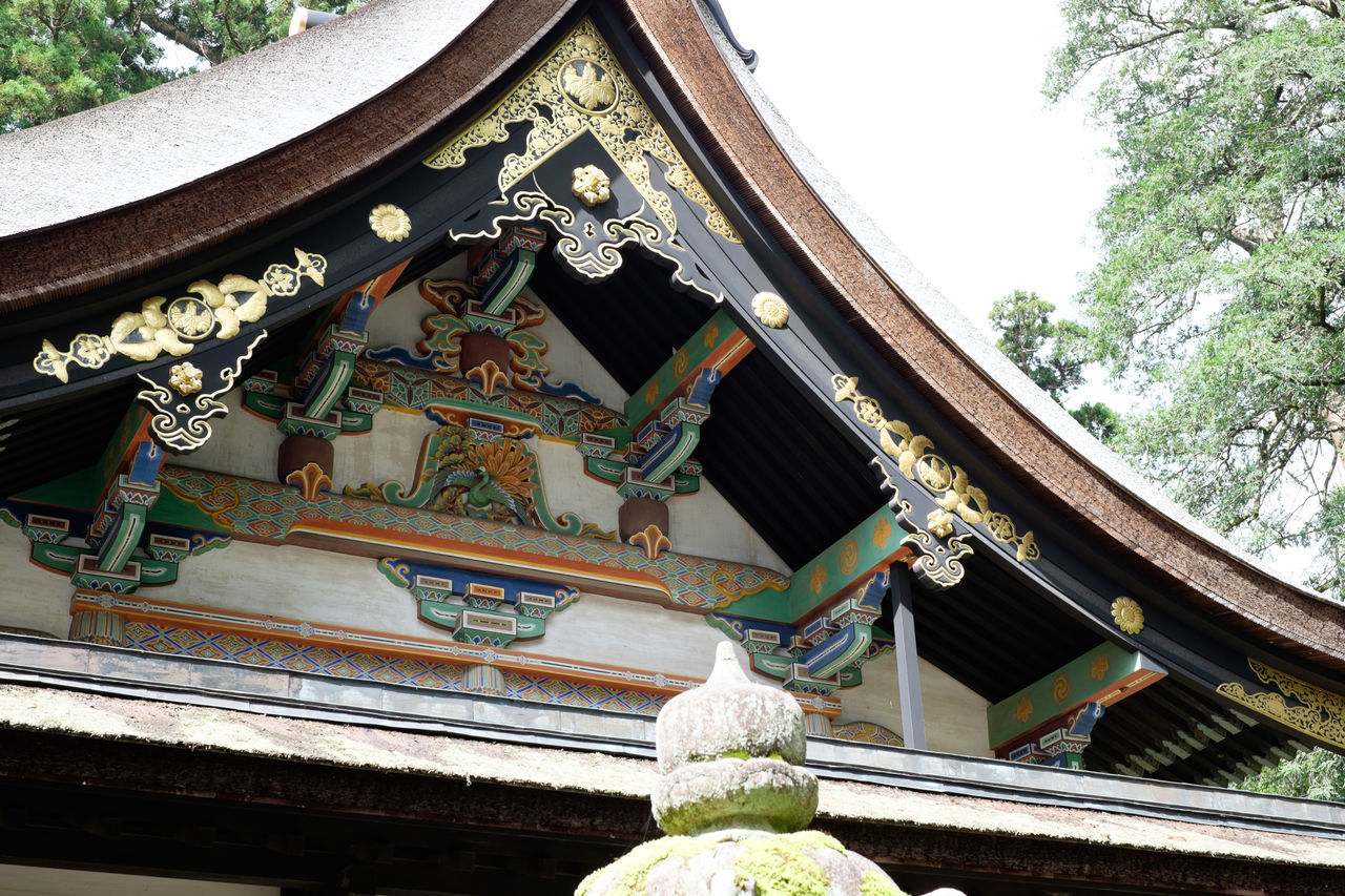 LOW ANGLE VIEW OF TEMPLE AGAINST SKY SEEN THROUGH BALCONY