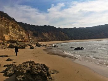 Scenic view of beach against sky