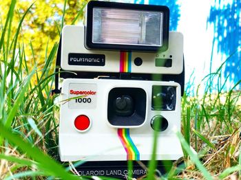 Close-up of camera on field