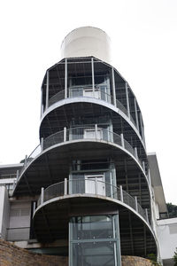 Low angle view of modern building against clear sky