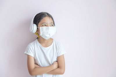 Portrait of boy against white background