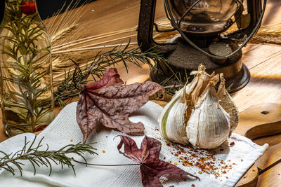 High angle view of bulb garlic on cutting board