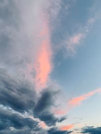 Low angle view of dramatic sky during sunset
