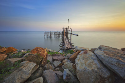 Scenic view of sea against sky during sunset