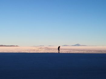 Full length of man on desert against sky