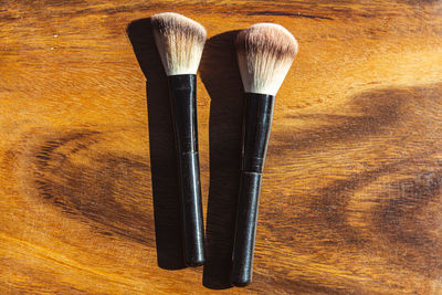 High angle view of paintbrushes on table