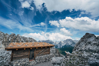 View of snowcapped mountain against cloudy sky