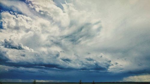 Scenic view of storm clouds over sea