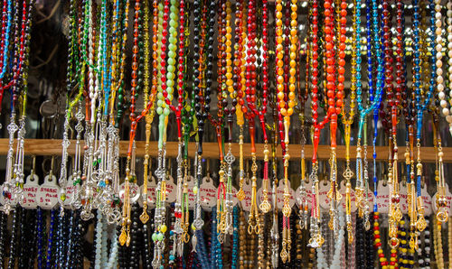 Close-up of colorful jewelry in market