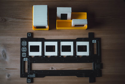 High angle view of telephone booth on table