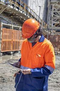 Man working with umbrella