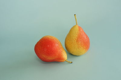 Close-up of fruit against white background