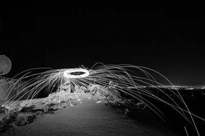 Close-up of illuminated lighting equipment at night