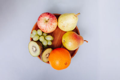 Close-up of fruits on white background