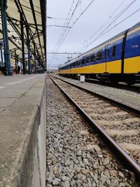 Railroad station platform against sky