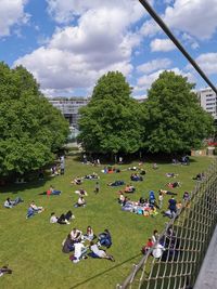 High angle view of people in park against sky