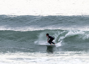 Man surfing in sea