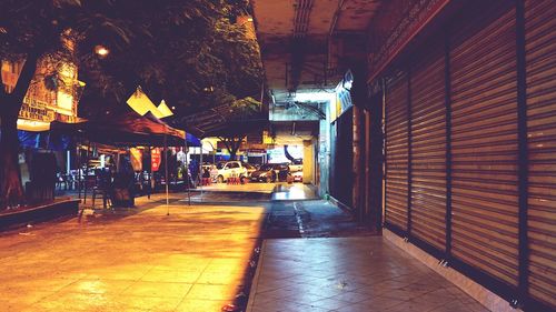 Illuminated corridor at night