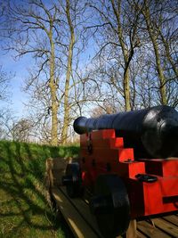 Close-up of red car against sky