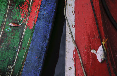 High angle view of multi colored umbrella on wood