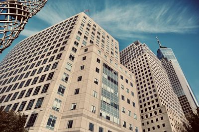 Low angle view of modern buildings against sky