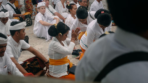 Group of people standing at temple