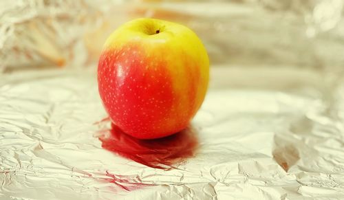 Close-up of apple on table