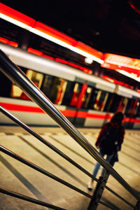 High angle view of people walking on escalator