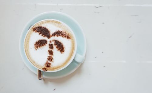 High angle view of cappuccino on table