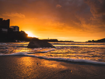 Scenic view of sea against sky during sunset