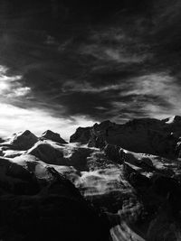 Scenic view of mountains against sky during winter