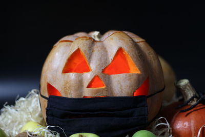 Close-up of pumpkin against black background