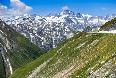 Scenic view of snowcapped mountains against sky