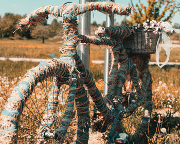 Close-up of bicycle on field