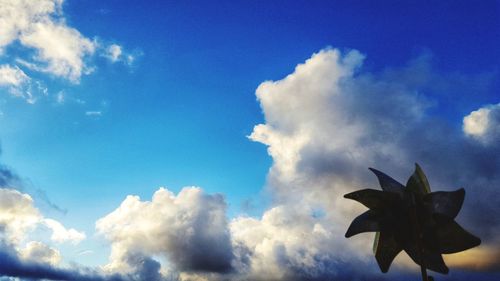 Low angle view of blue sky and clouds
