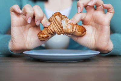 Close-up of hand holding ice cream