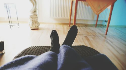 Low section of man at home