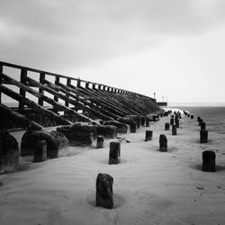 View of beach against cloudy sky