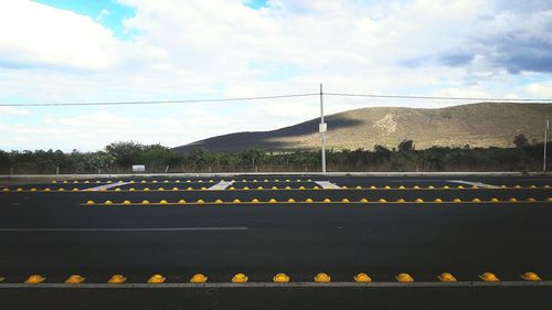 Scenic view of road against sky