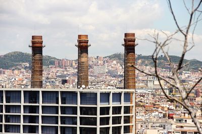 Modern buildings in city against sky