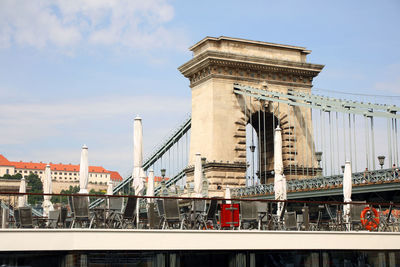 View of bridge against cloudy sky