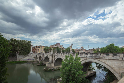 Panoramic of st. angelo bridge on cloudy day in summer 2021 italy.with cloudy day.