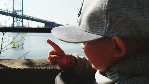 Close-up of boy wearing cap