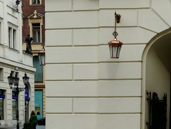 Clothes hanging on wall in city