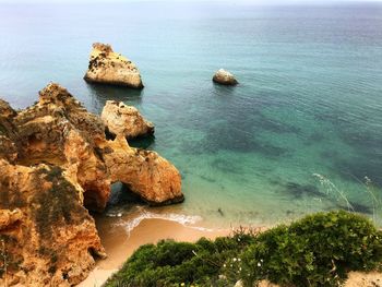 High angle view of rocks in sea