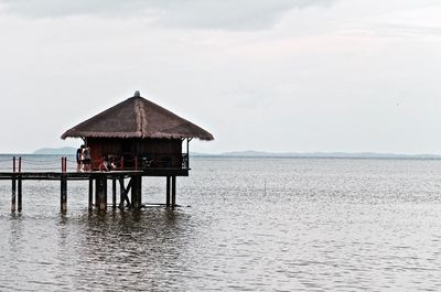 Pier on sea against sky