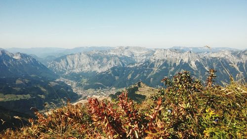 High angle view of valley and mountains against sky